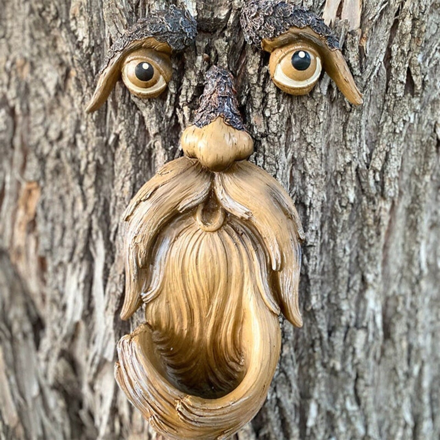 Visage-mangeoire en résine en forme d'arbre